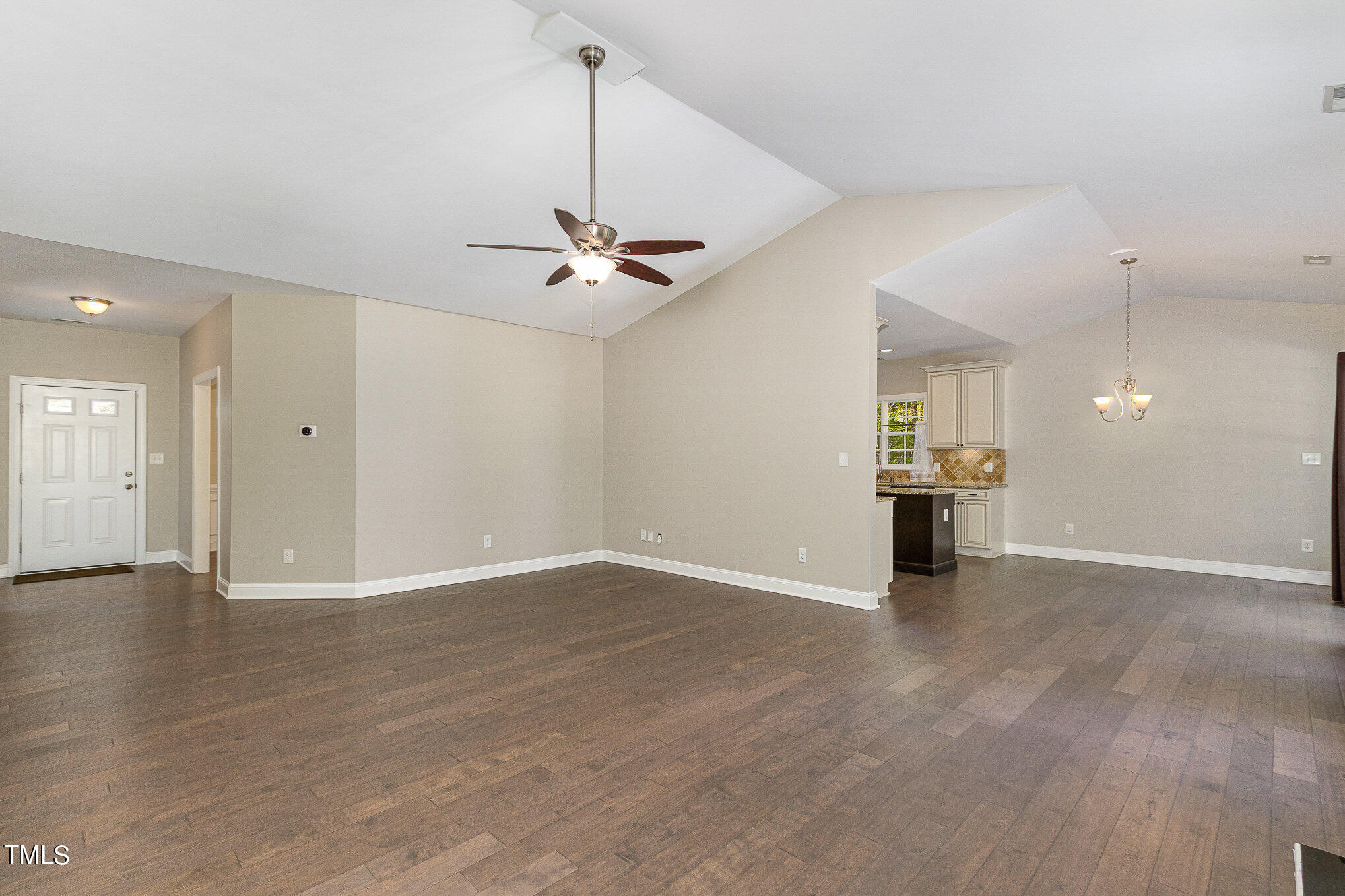 3640 Pineview Circle Durham, NC 27705 - Photo 5 of 41 a view of an empty room with a chandelier
