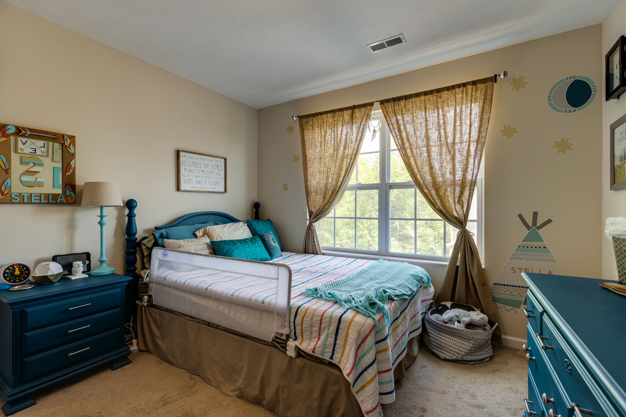 4757 Backstretch Boulevard Antioch, TN 37013 - Photo 18 of 39 a bedroom with a bed and a window