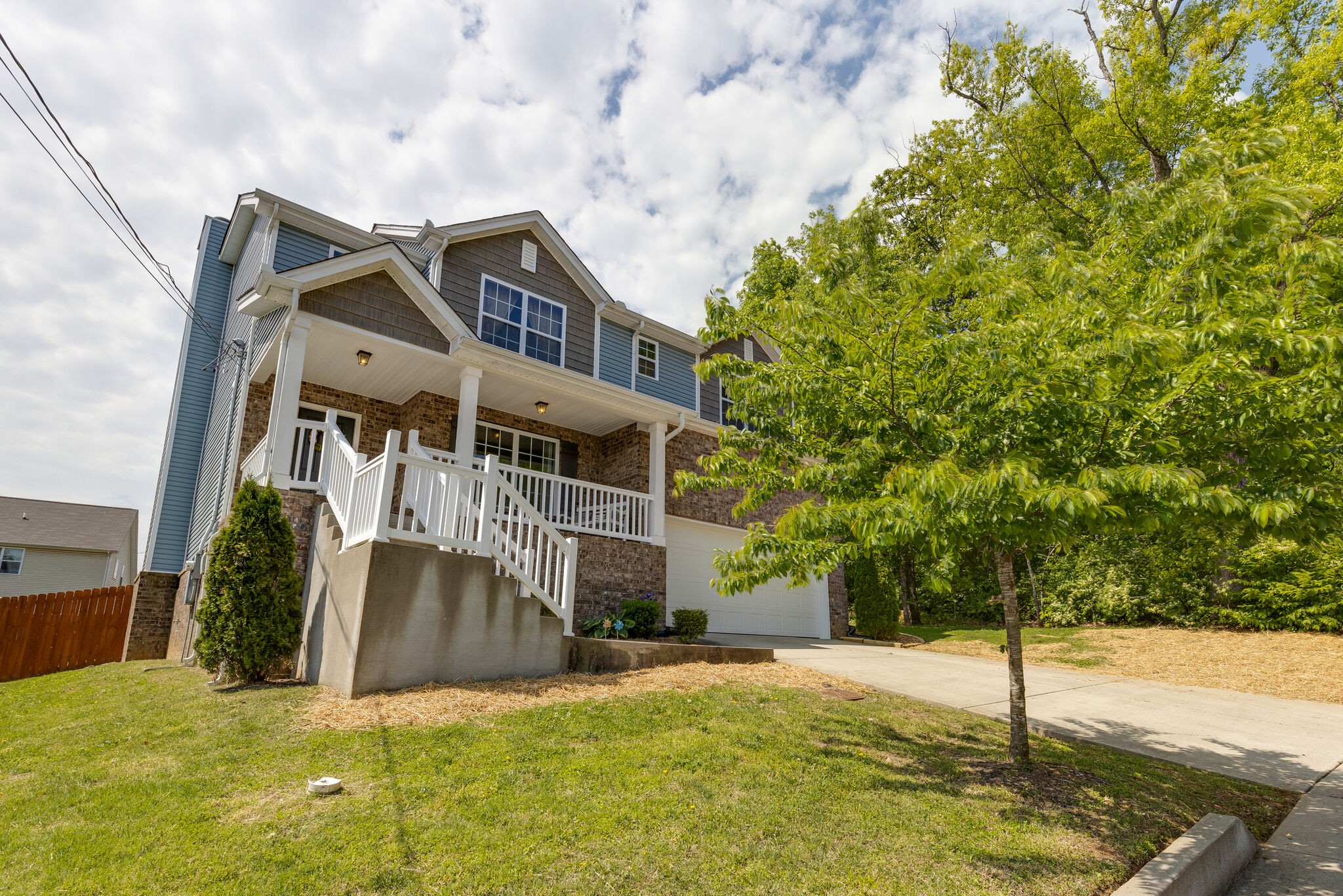 4757 Backstretch Boulevard Antioch, TN 37013 - Photo 2 of 39 a house that has a tree in front of it