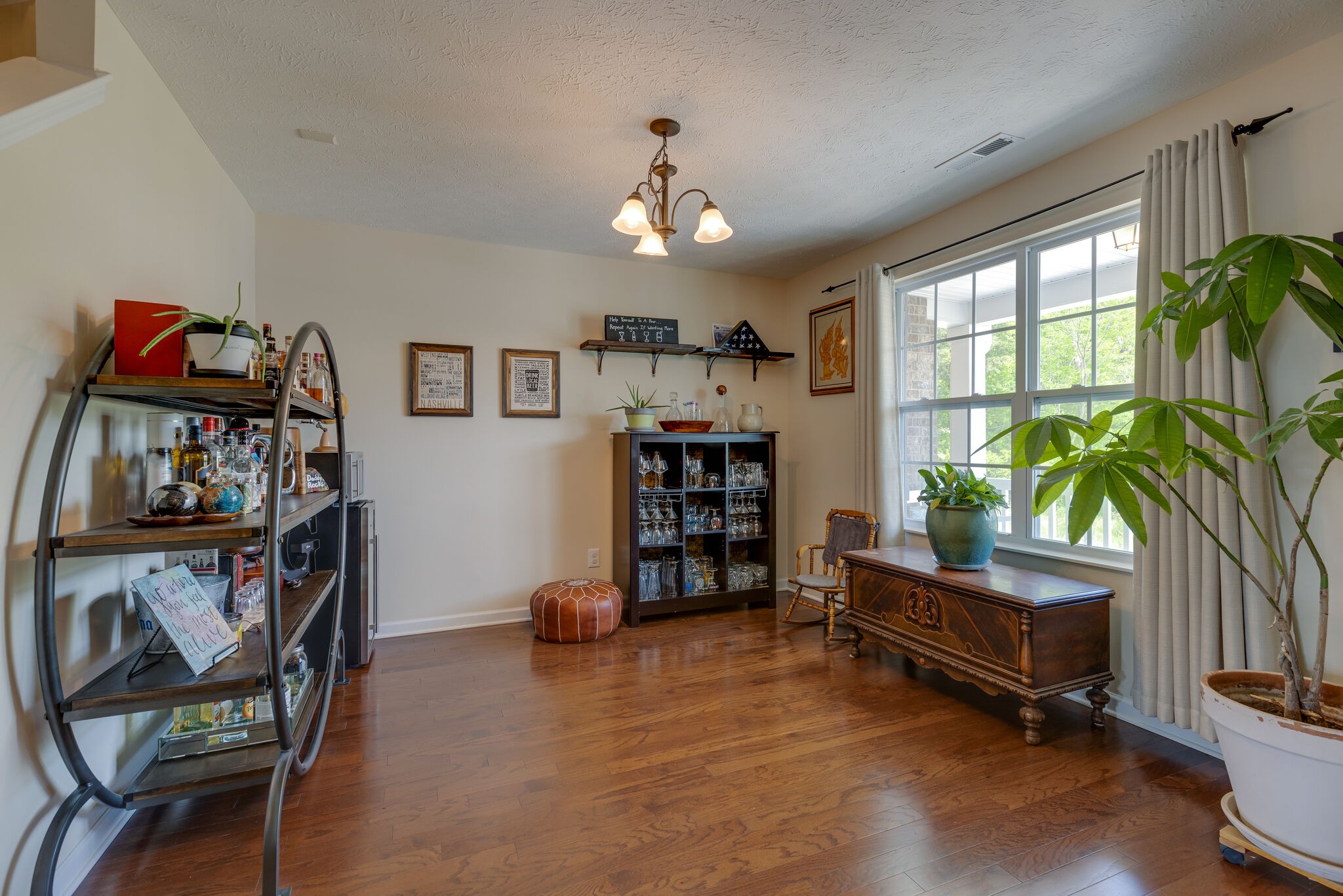 4757 Backstretch Boulevard Antioch, TN 37013 - Photo 7 of 39 a living room with furniture and a flat screen tv