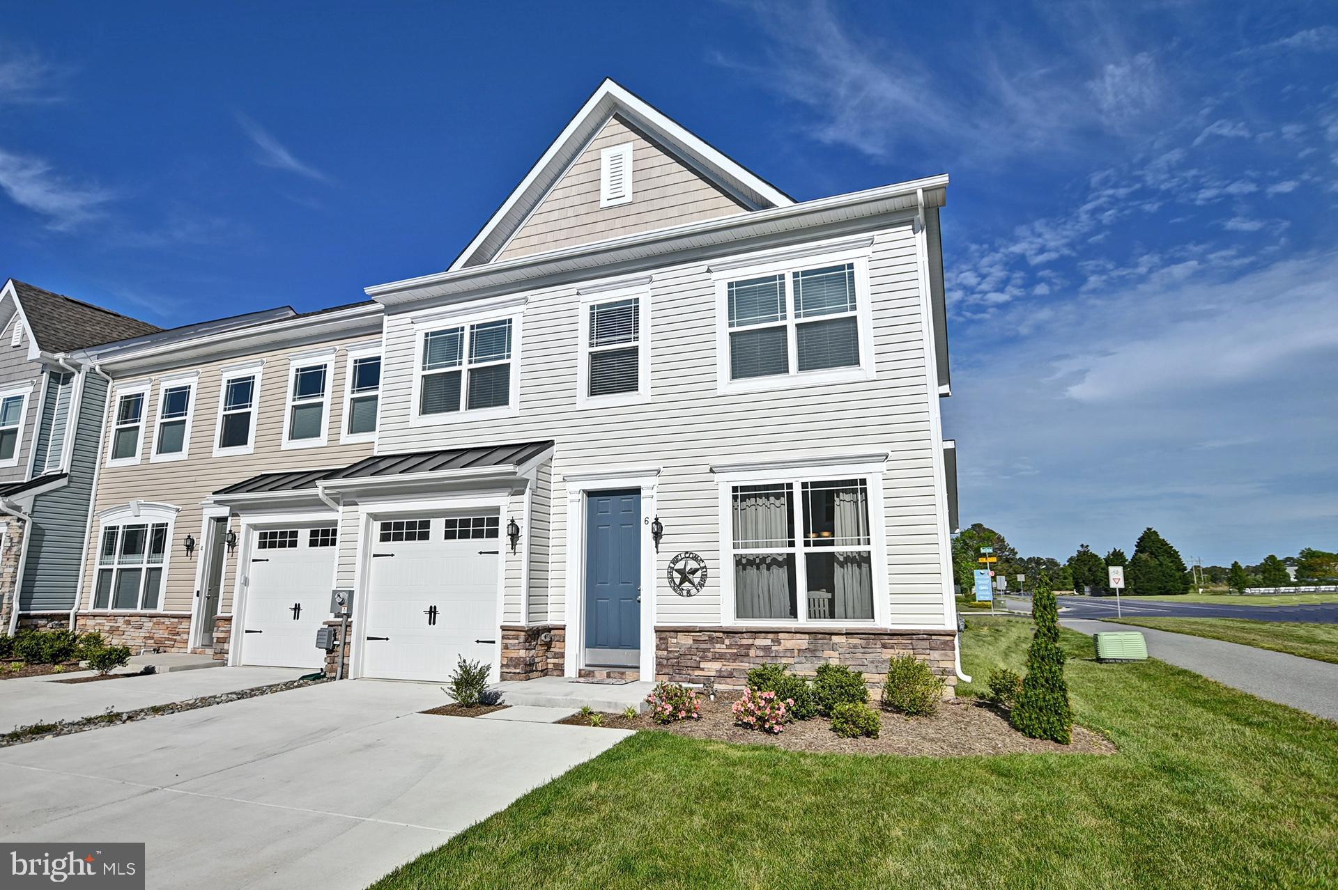 6 Basin Cove Way Ocean View, DE 19970 - Photo 1 of 45 a front view of a house with a yard
