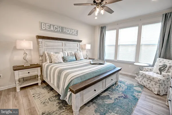 a bedroom with bed and window