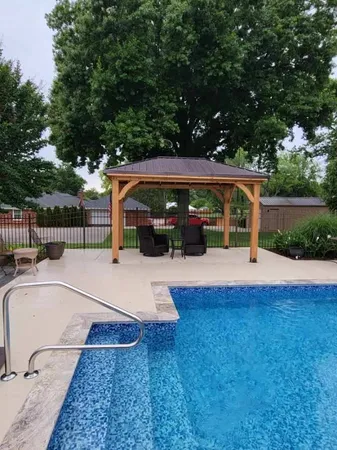 a view of a swimming pool with a lake view