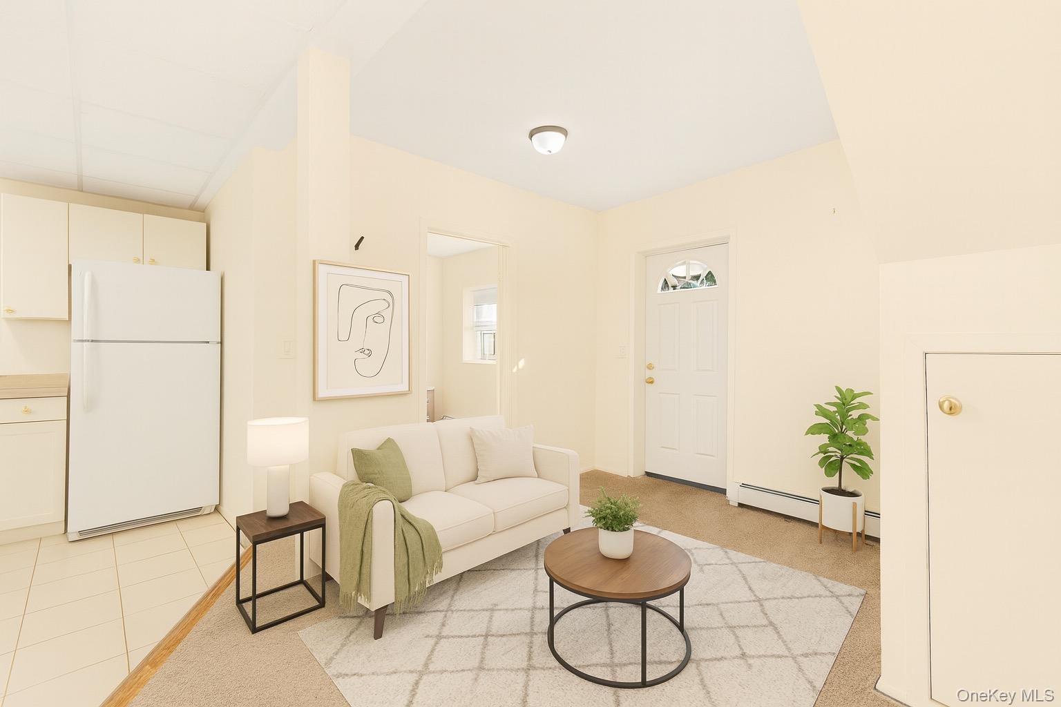 a living room with furniture and white walls