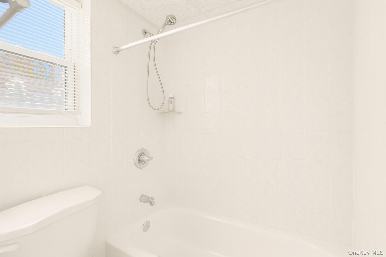 174 Mills Pond Road, Unit B St. James, NY 11780 - Photo 4 of 4 a bathroom with a shower