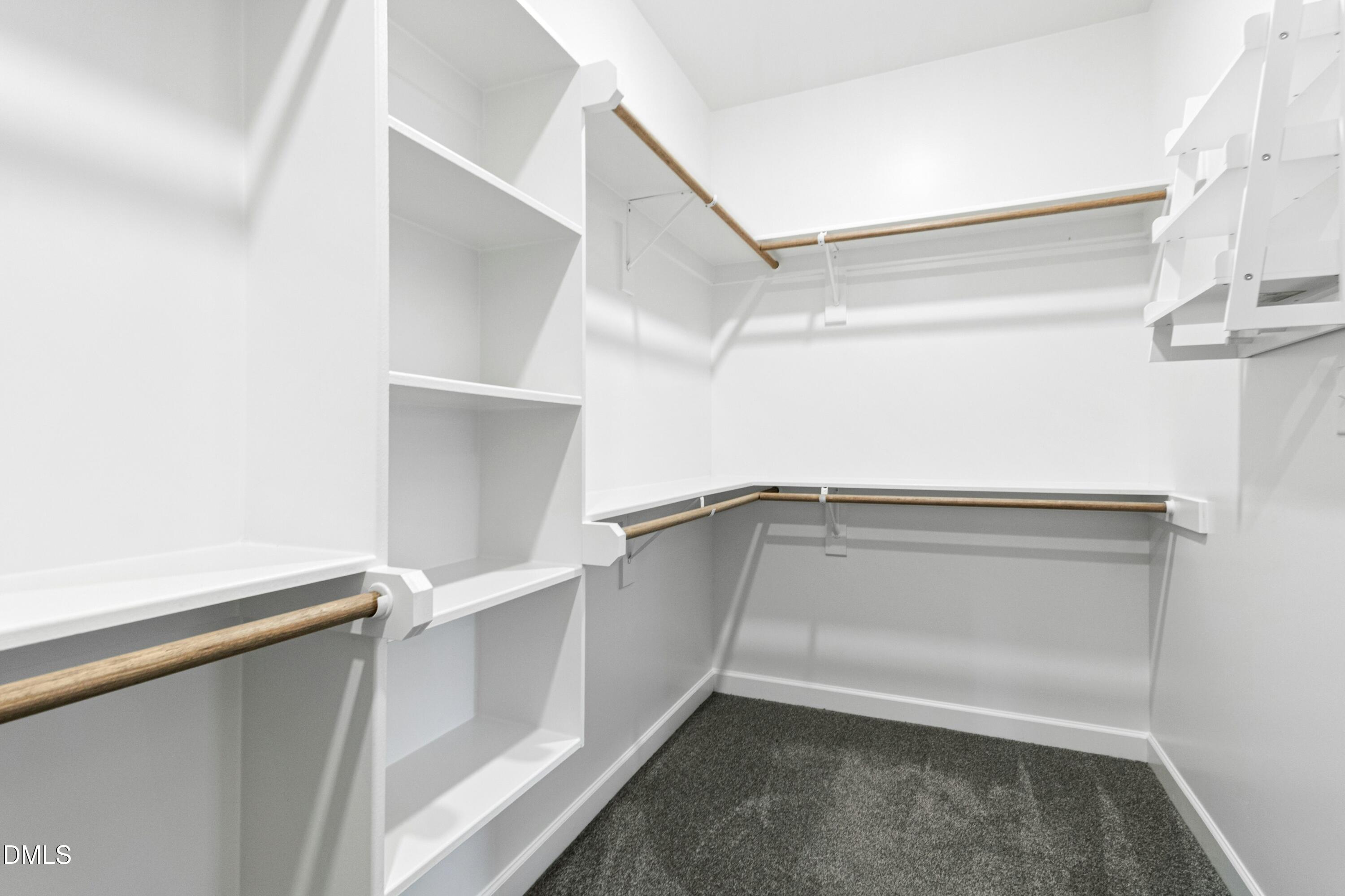 165 Thunder Ridge Drive Garner, NC 27529 - Photo 22 of 32 a view of an empty walk in closet