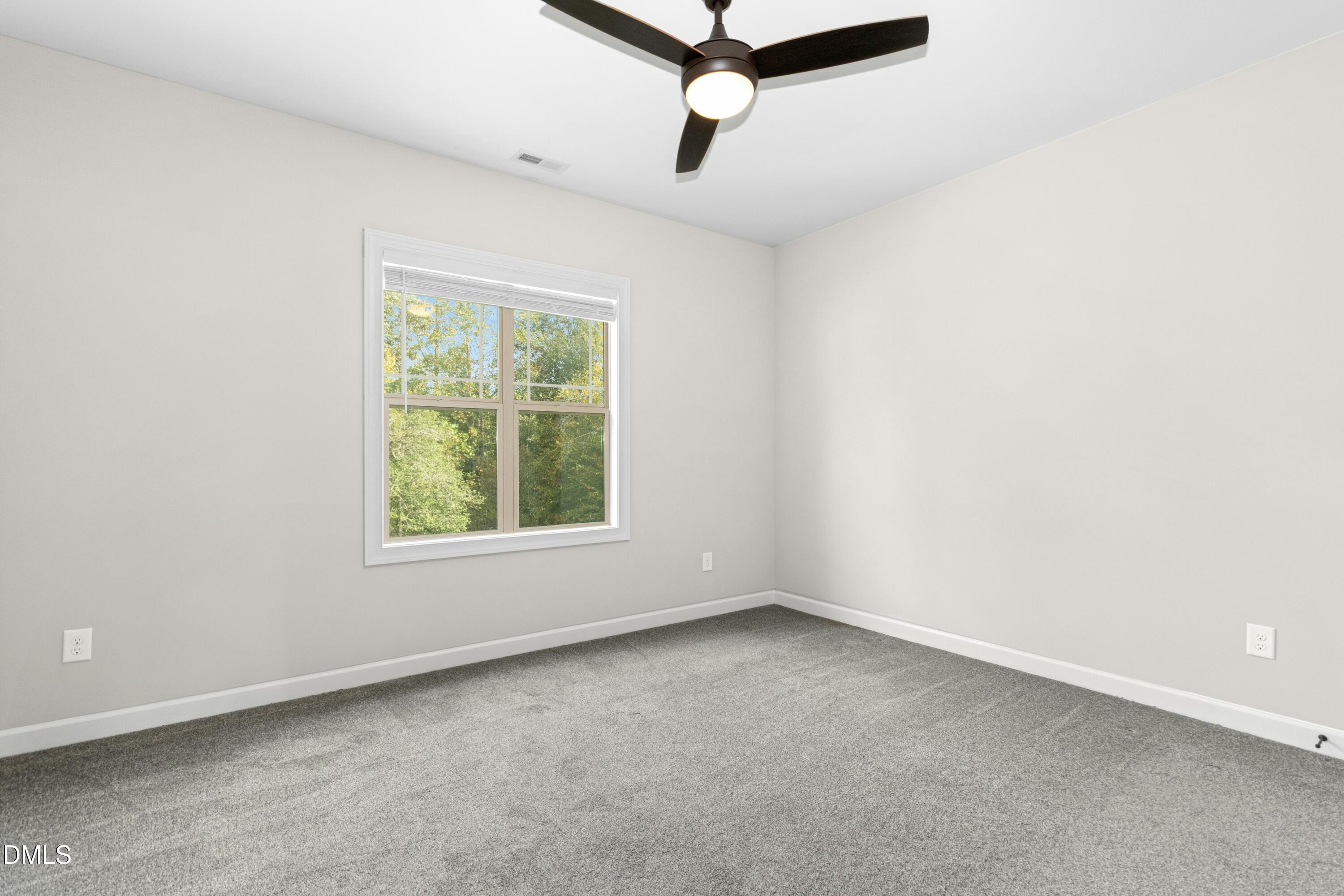165 Thunder Ridge Drive Garner, NC 27529 - Photo 23 of 32 an empty room with a window