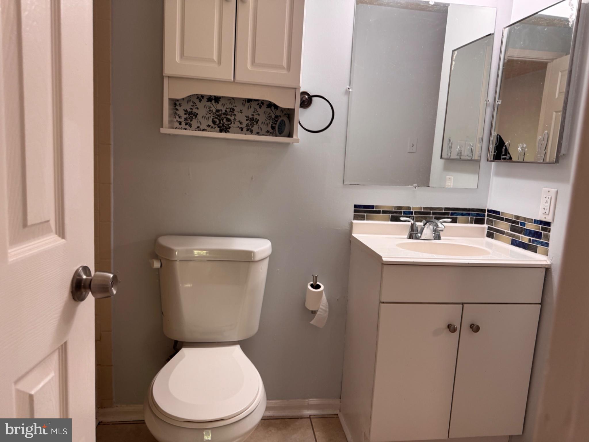 6917 Villa-Del-Rey Court Springfield, VA 22150 - Photo 12 of 26 Modern bathroom with sleek finishes.