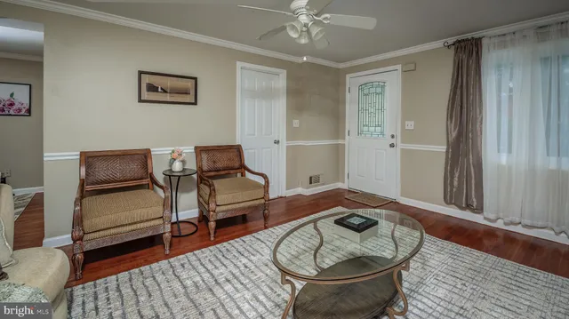 a room with furniture and a rug