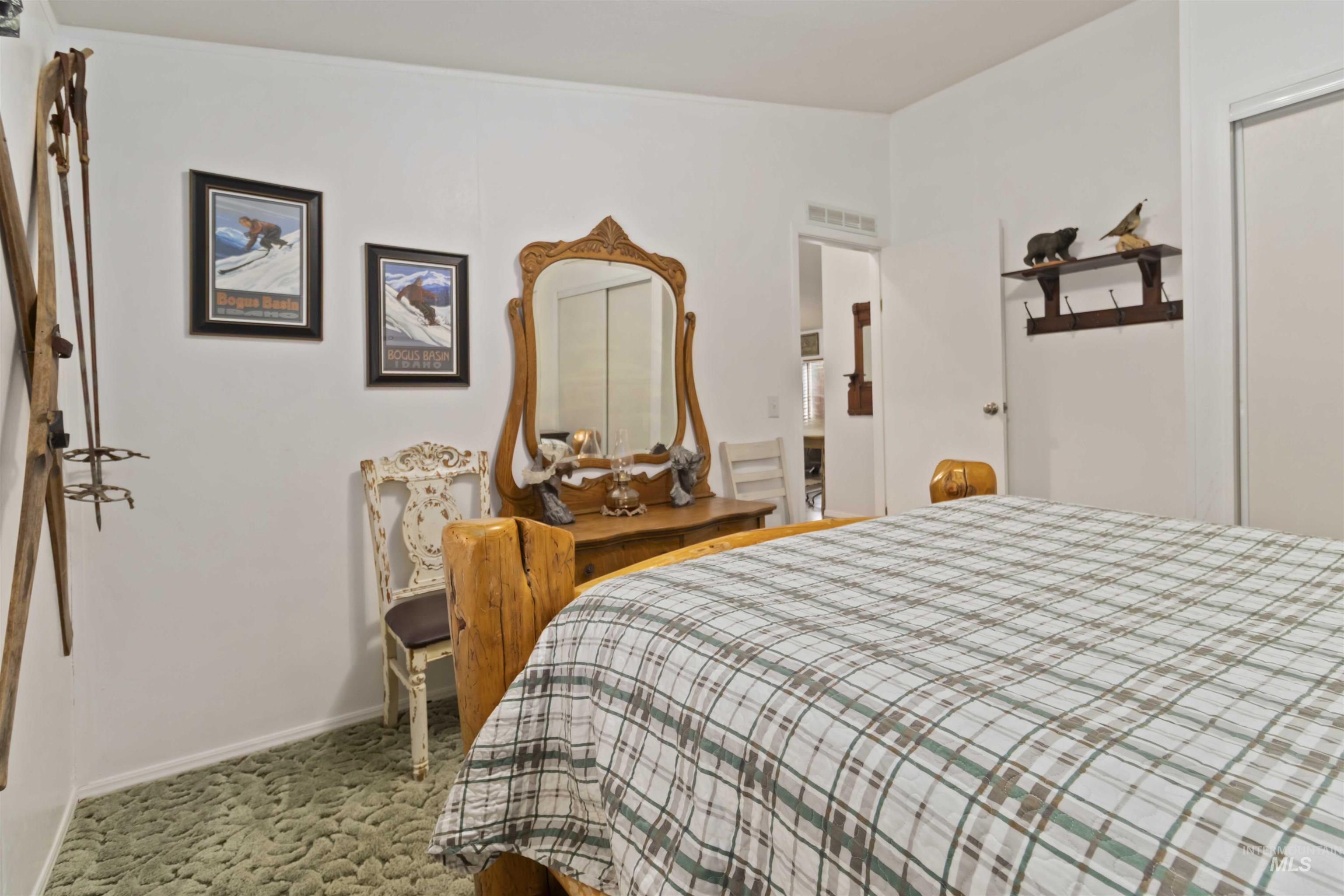 9592 Packer John Road Cascade, ID 83611 - Photo 35 of 47 Carpeted bedroom with baseboards