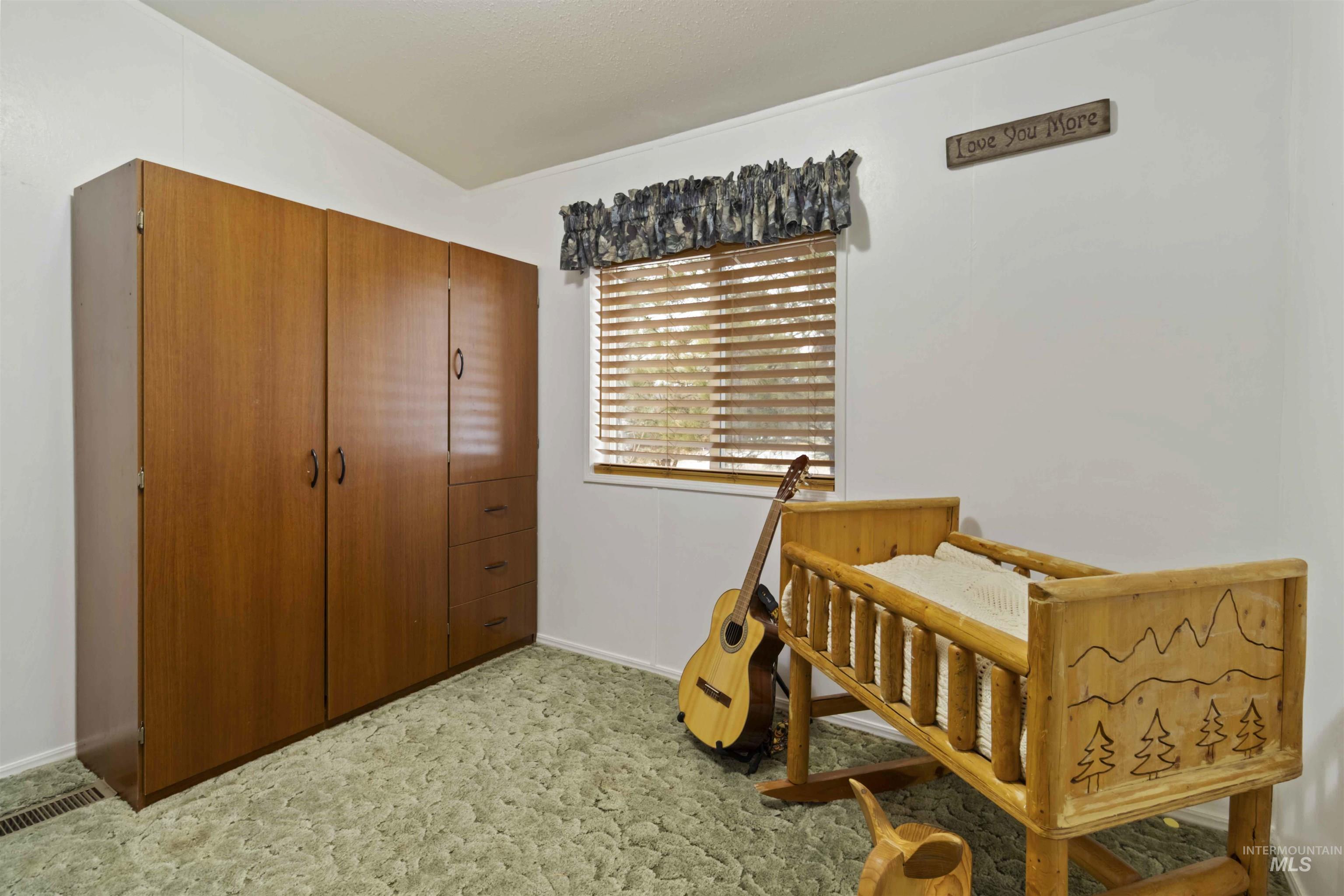 9592 Packer John Road Cascade, ID 83611 - Photo 39 of 47 Bedroom featuring a closet and baseboards