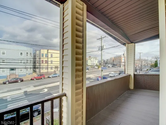 a kitchen with stainless steel appliances granite countertop a sink and wooden cabinets