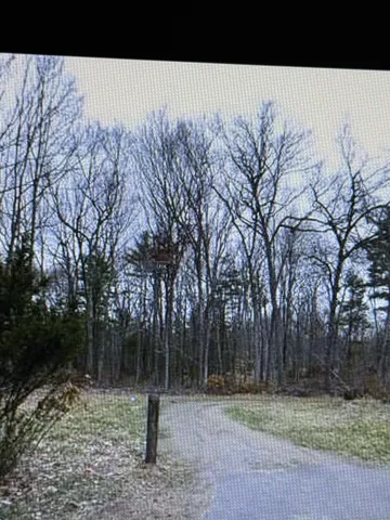a black and white photo of a house