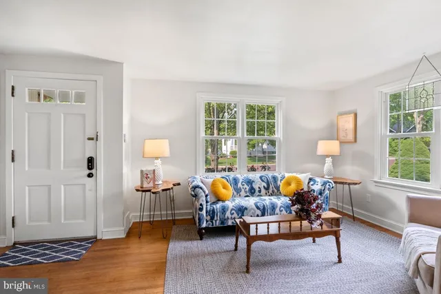 a living room with furniture and window