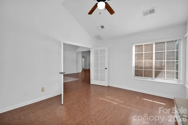 a kitchen with stainless steel appliances granite countertop a sink and a stove