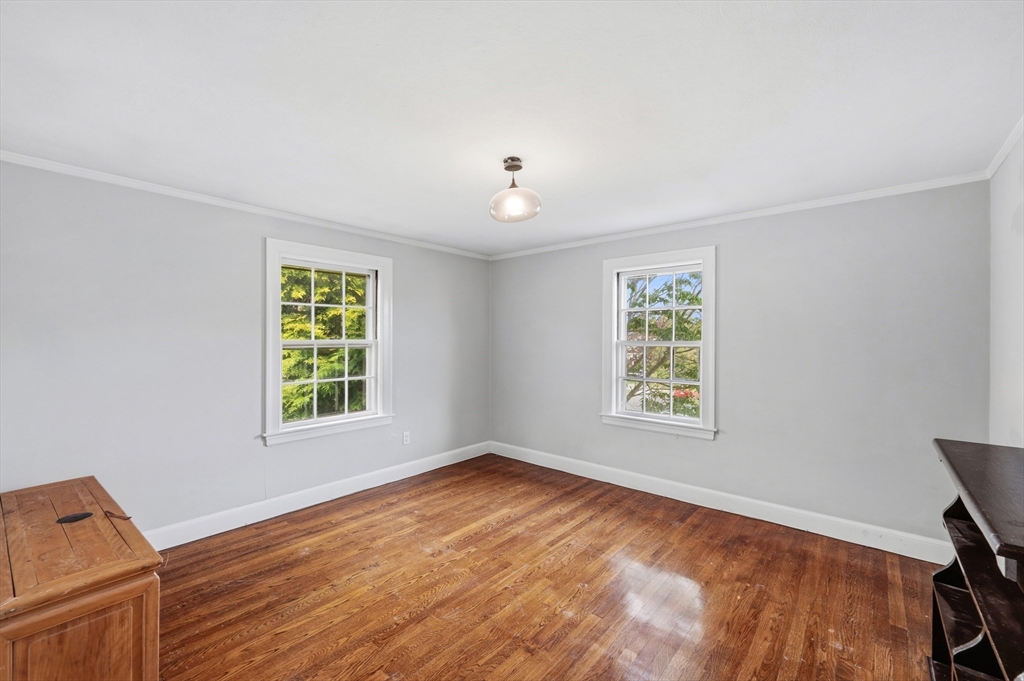 26 Pickwick Road Marblehead, MA 01945 - Photo 27 of 40 wooden floor in an empty room with a window