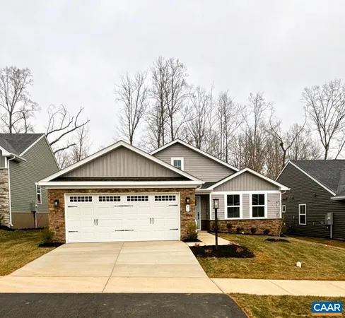 a house with trees in the background