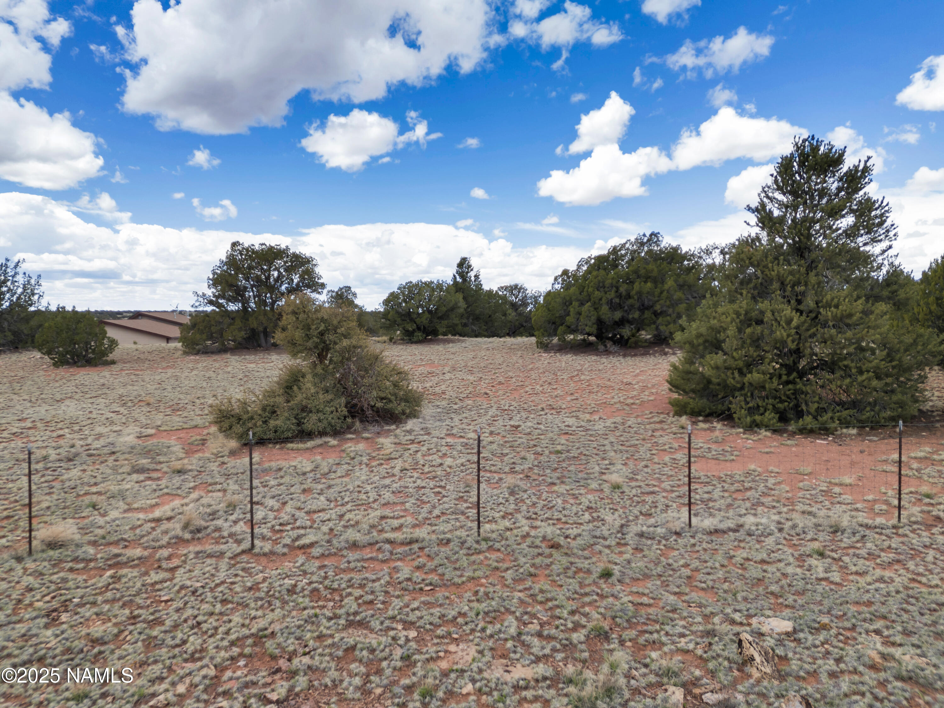 8752 South Lariat Road Williams, AZ 86046 - Photo 28 of 38 a view of a pathway with a wrought fence