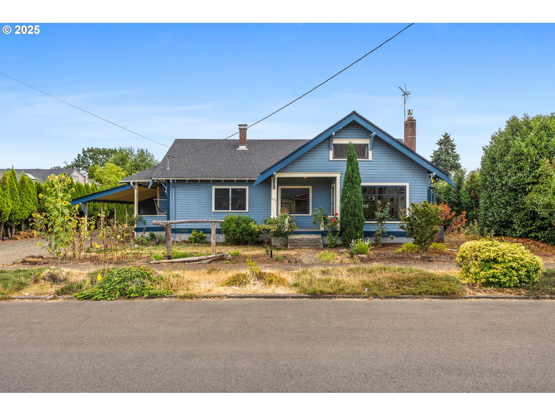 a house view with a garden space