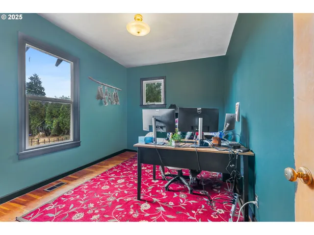 a bed room with a bed and a table