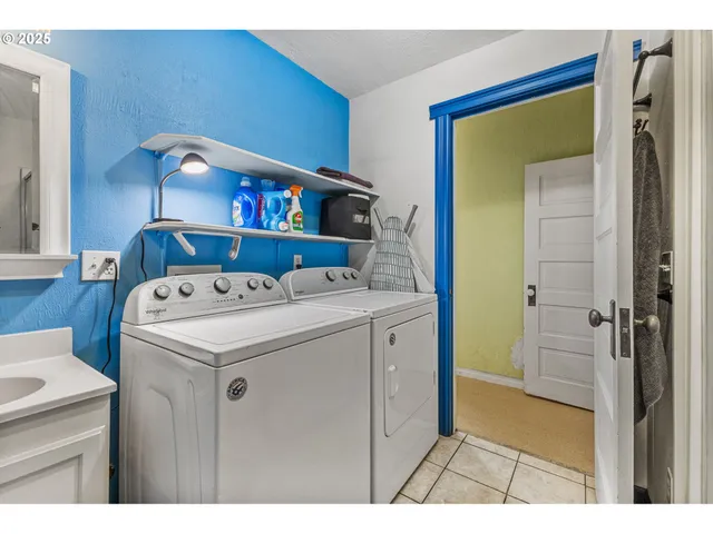 a utility room with dryer and washer