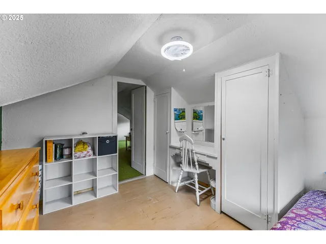 a view of living room filled with furniture and window