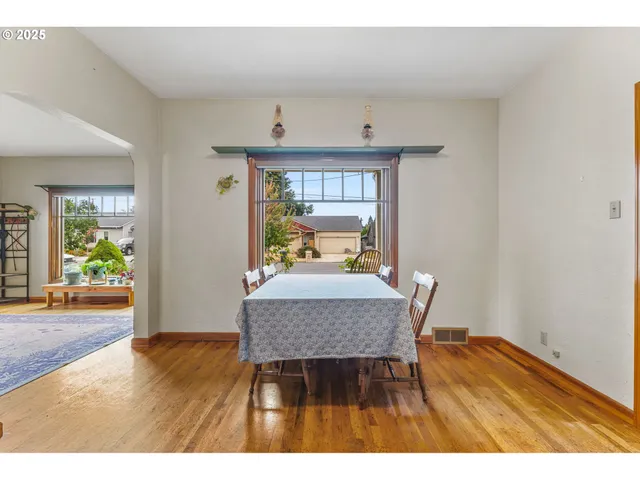 a view of kitchen with furniture and wooden floor