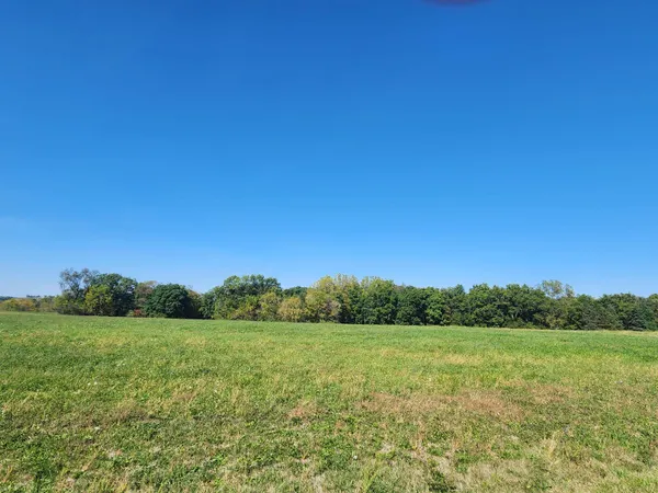 a view of an outdoor space and a yard