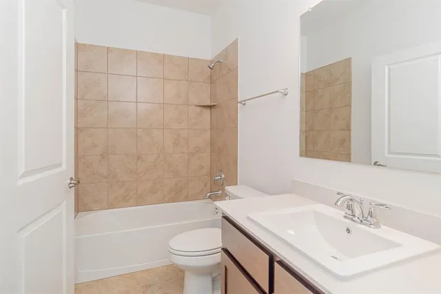 a front view of a house with a garage