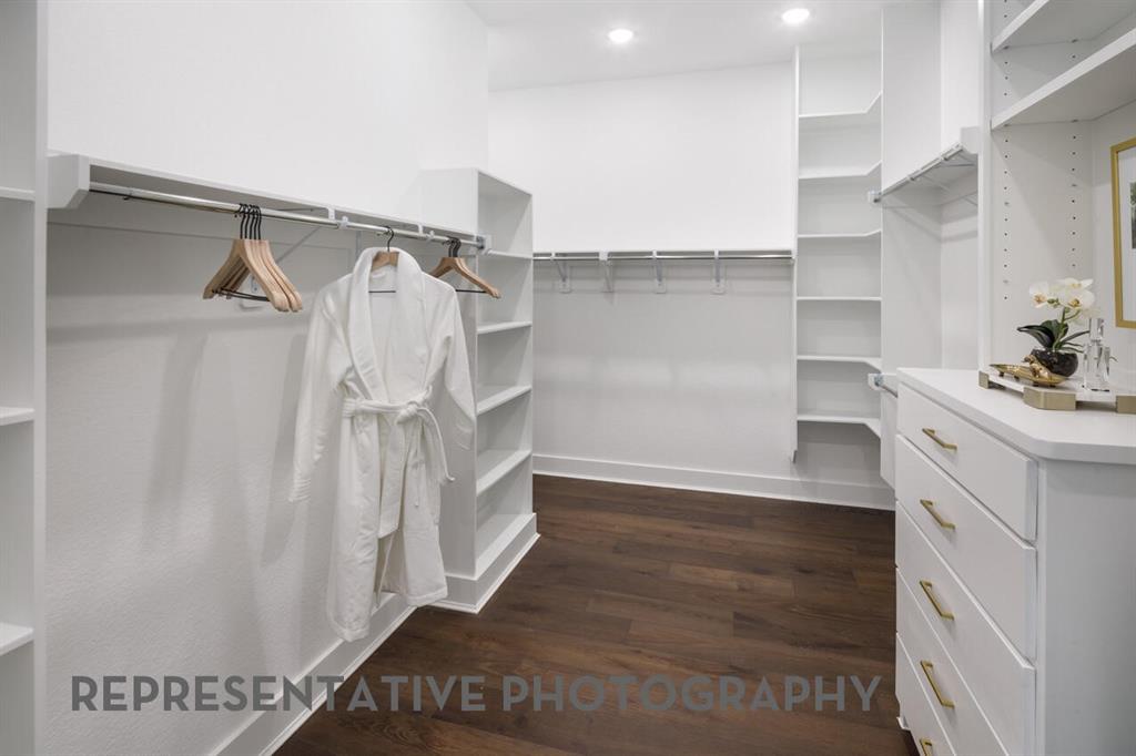 3625 Meander Way Prosper, TX 75078 - Photo 23 of 40 a view of walk in closet with clothes and shoes