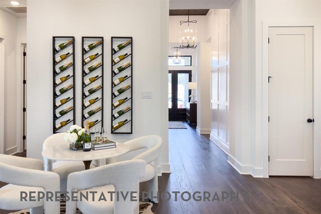 3625 Meander Way Prosper, TX 75078 - Photo 35 of 40 a living room with furniture and wooden floor