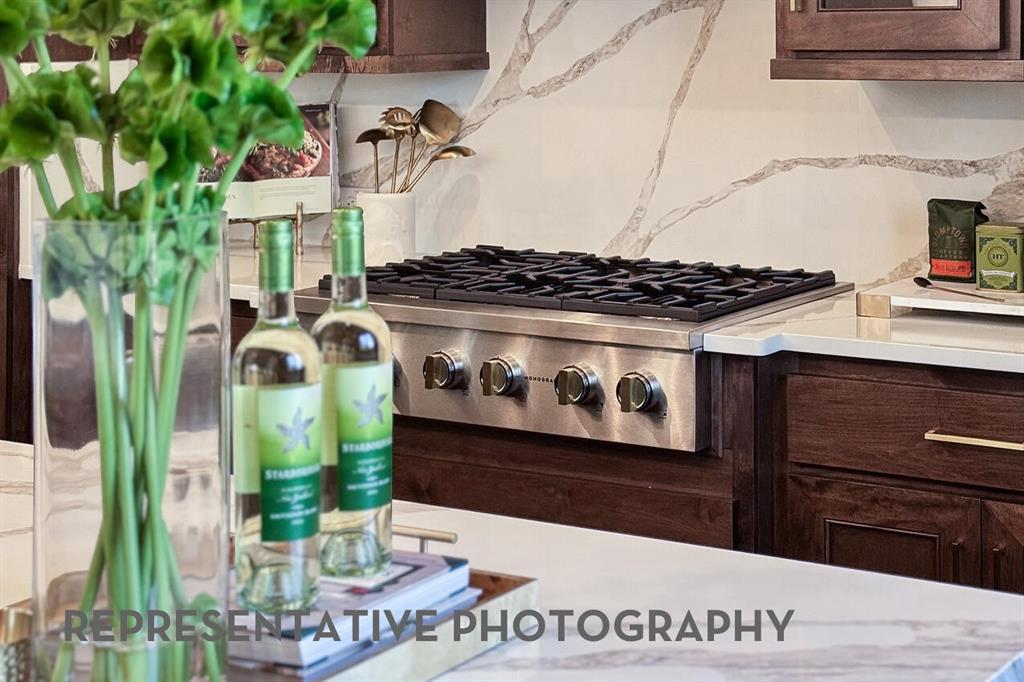 3625 Meander Way Prosper, TX 75078 - Photo 7 of 40 a stove top oven sitting inside of a kitchen
