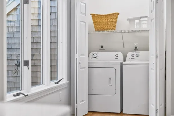 a utility room with dryer and washer