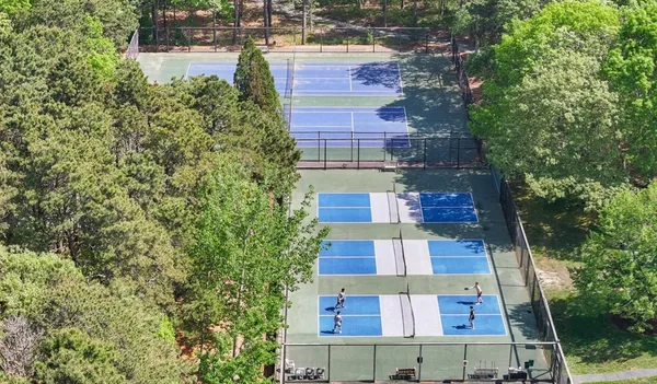 a bathroom with a sink mirror and vanity