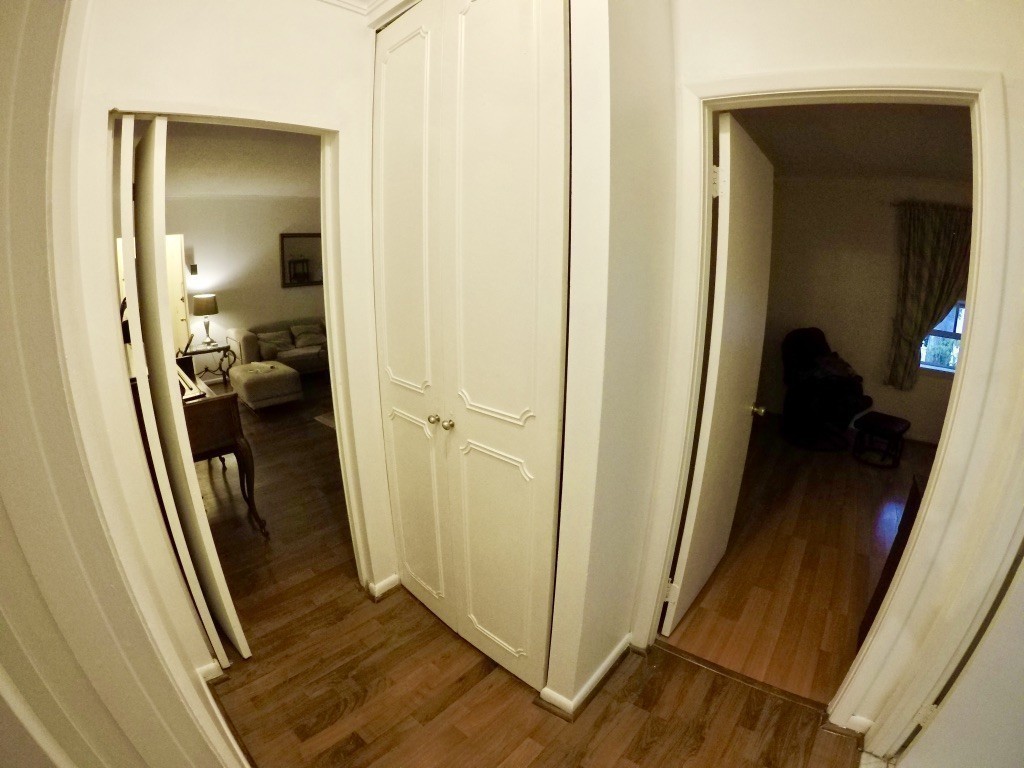 210 Lake Shore Road, Unit 3 Boston, MA 02135 - Photo 19 of 20 a view of a hallway and a living room