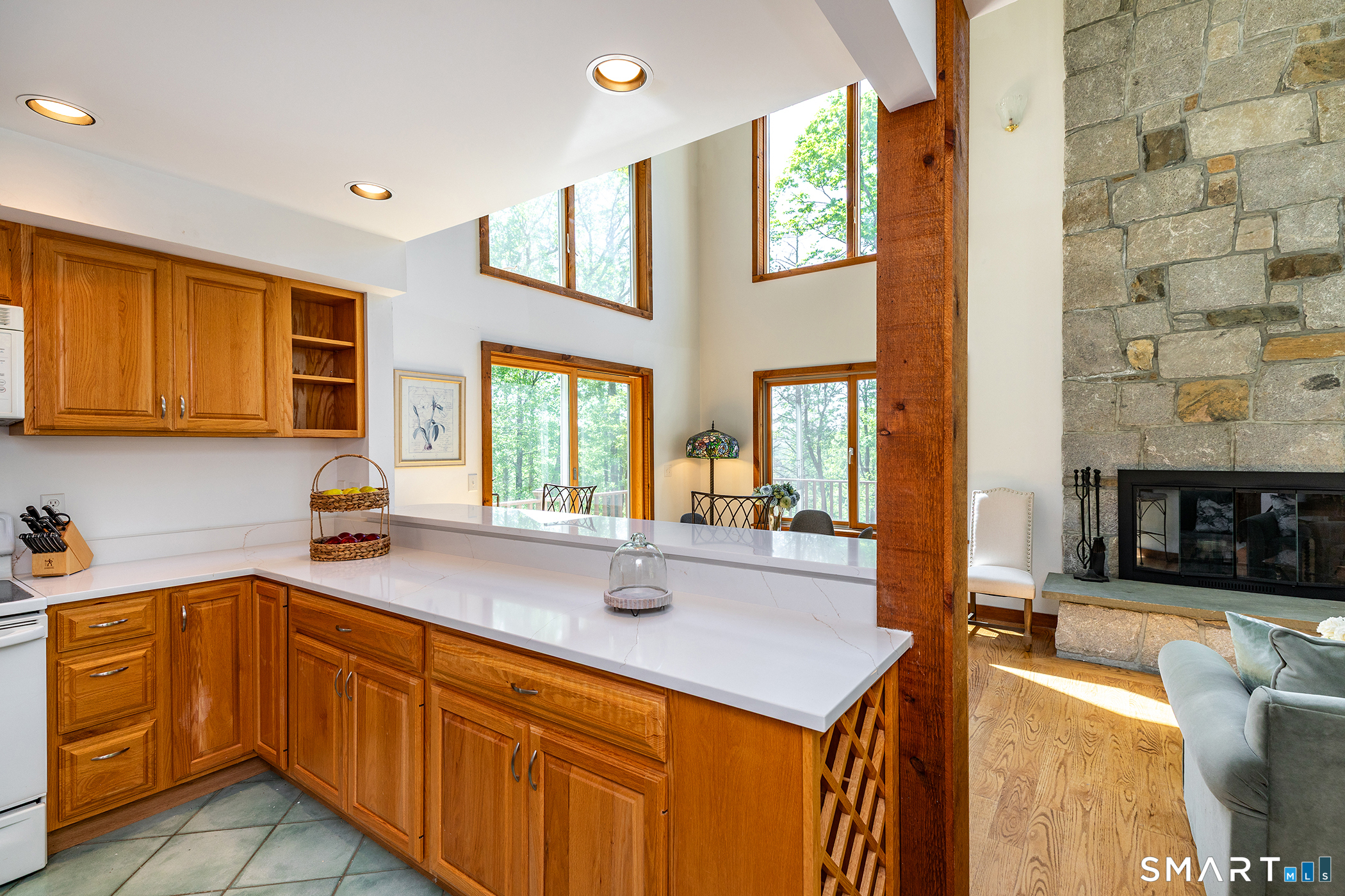 3 Old Forest Road Sherman, CT 06784 - Photo 15 of 38 a kitchen with stainless steel appliances granite countertop a sink and cabinets