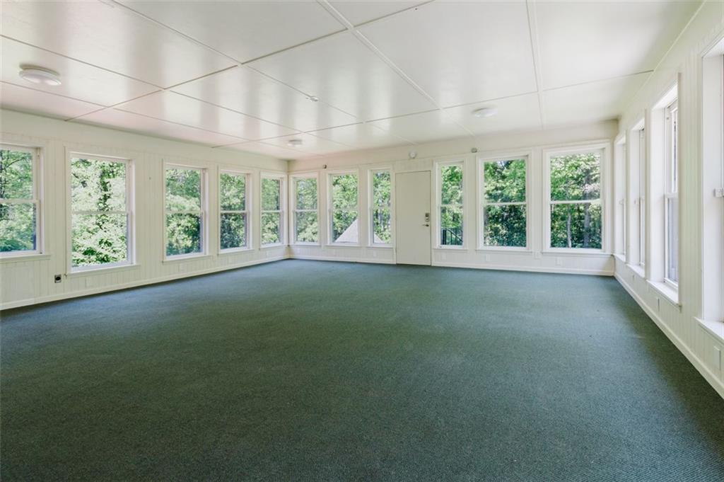 11433 Panhandle Road Hampton, GA 30228 - Photo 14 of 22 a view of an empty room with a large window