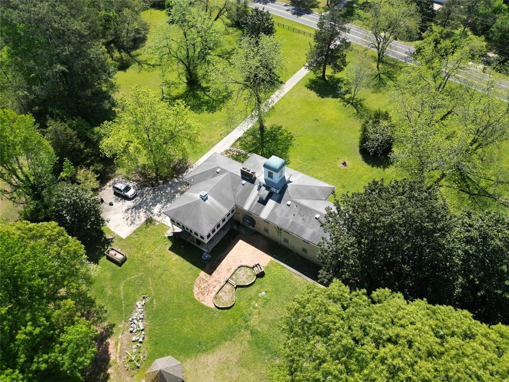 11433 Panhandle Road Hampton, GA 30228 - Photo 21 of 22 an aerial view of residential house with swimming pool and lawn chairs