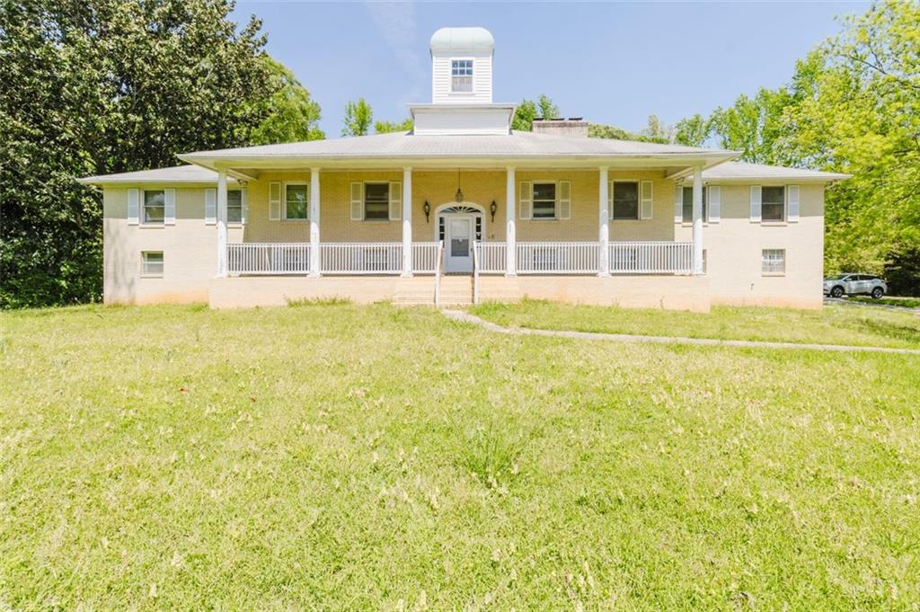 11433 Panhandle Road Hampton, GA 30228 - Photo 22 of 22 a view of a house with pool