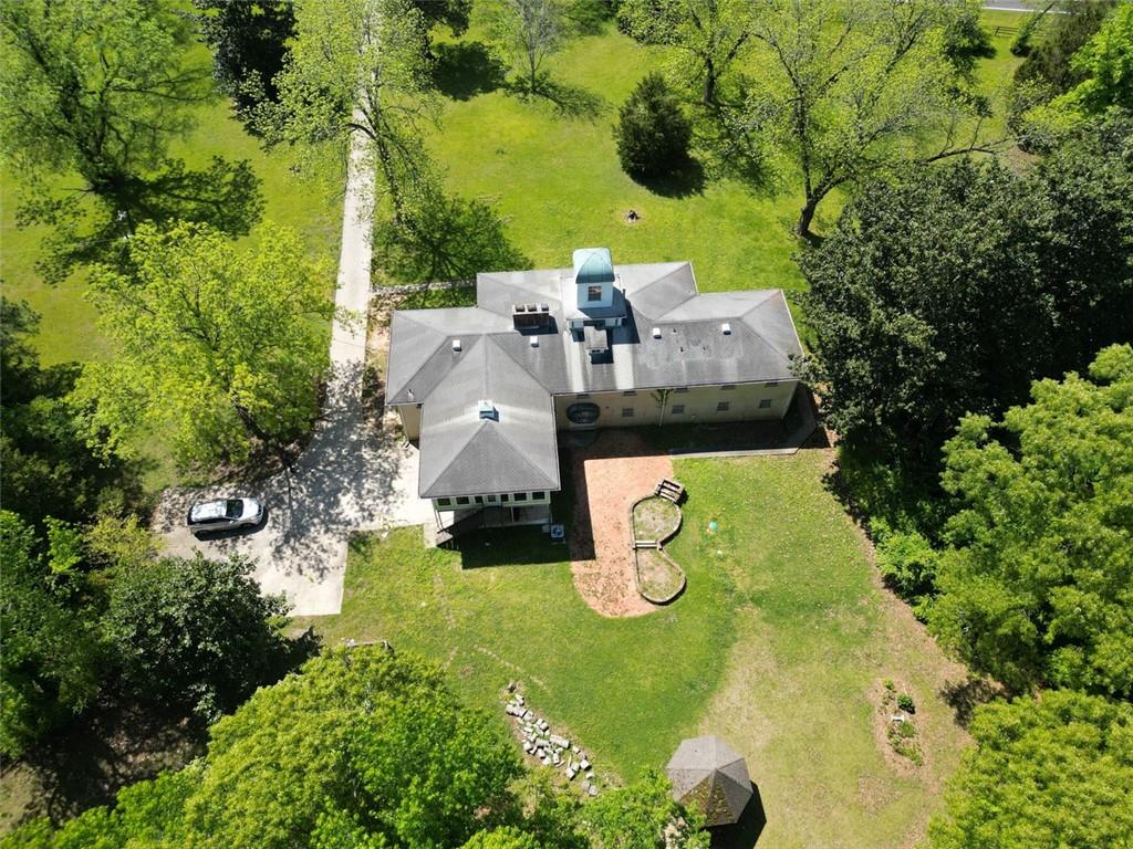 11433 Panhandle Road Hampton, GA 30228 - Photo 3 of 22 an aerial view of a house with yard swimming pool and outdoor seating