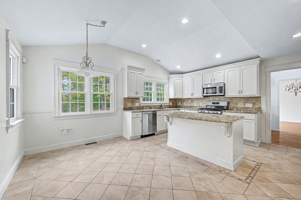 3 Oak View Terrace, Unit 3 Franklin, MA 02038 - Photo 7 of 38 a kitchen with white cabinets and window