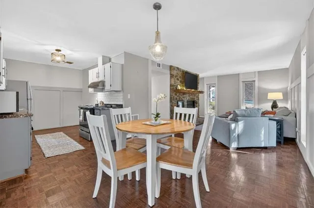 a view of a dining room with furniture