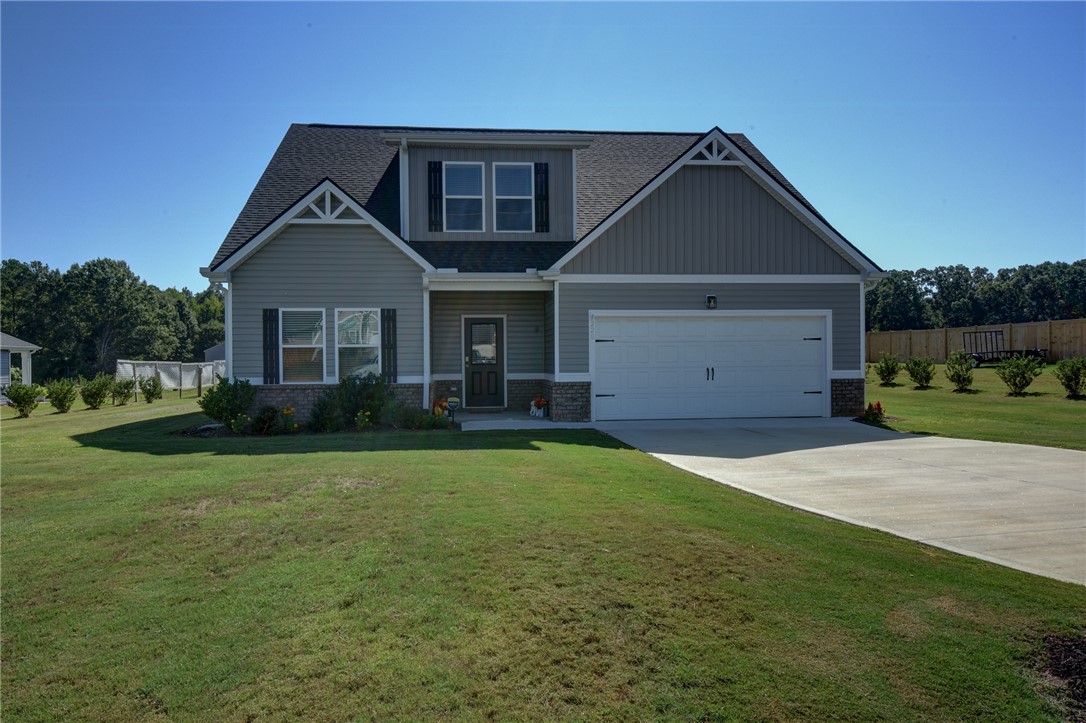 220 Clinkscales Road Anderson, SC 29624 - Photo 1 of 33 Gable accents and a concrete driveway define the exterior of this modern multi-level home.