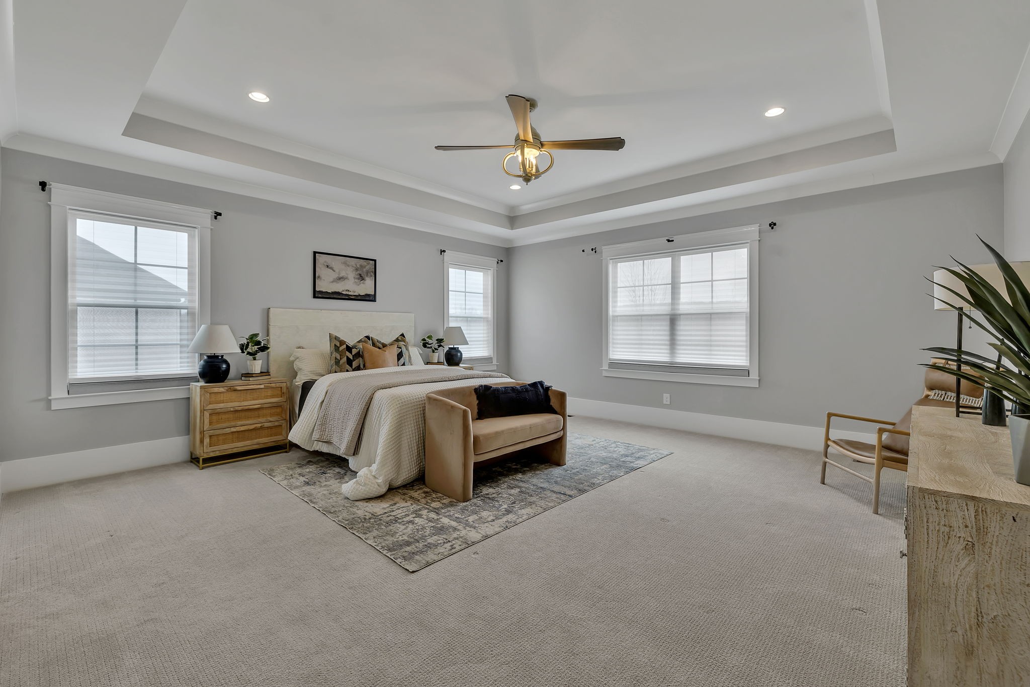 5821 Wagonvale Drive Arrington, TN 37014 - Photo 31 of 69 a spacious bedroom with a bed a couch and a window