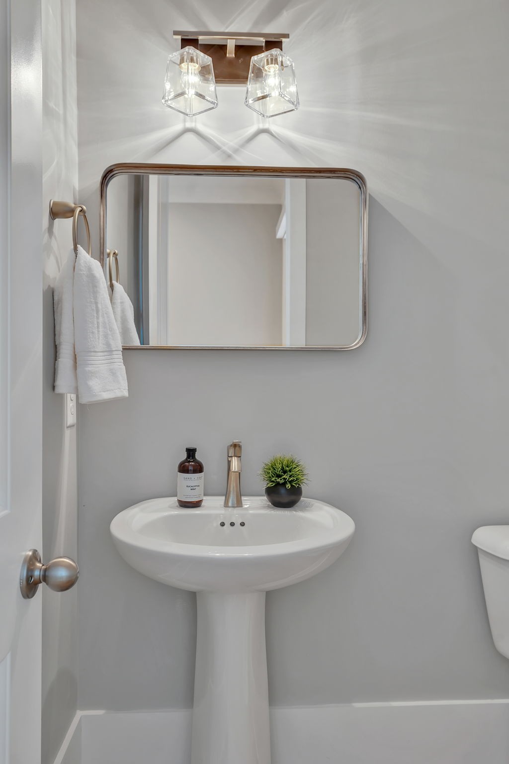 5821 Wagonvale Drive Arrington, TN 37014 - Photo 44 of 69 a bathroom with a sink and a mirror