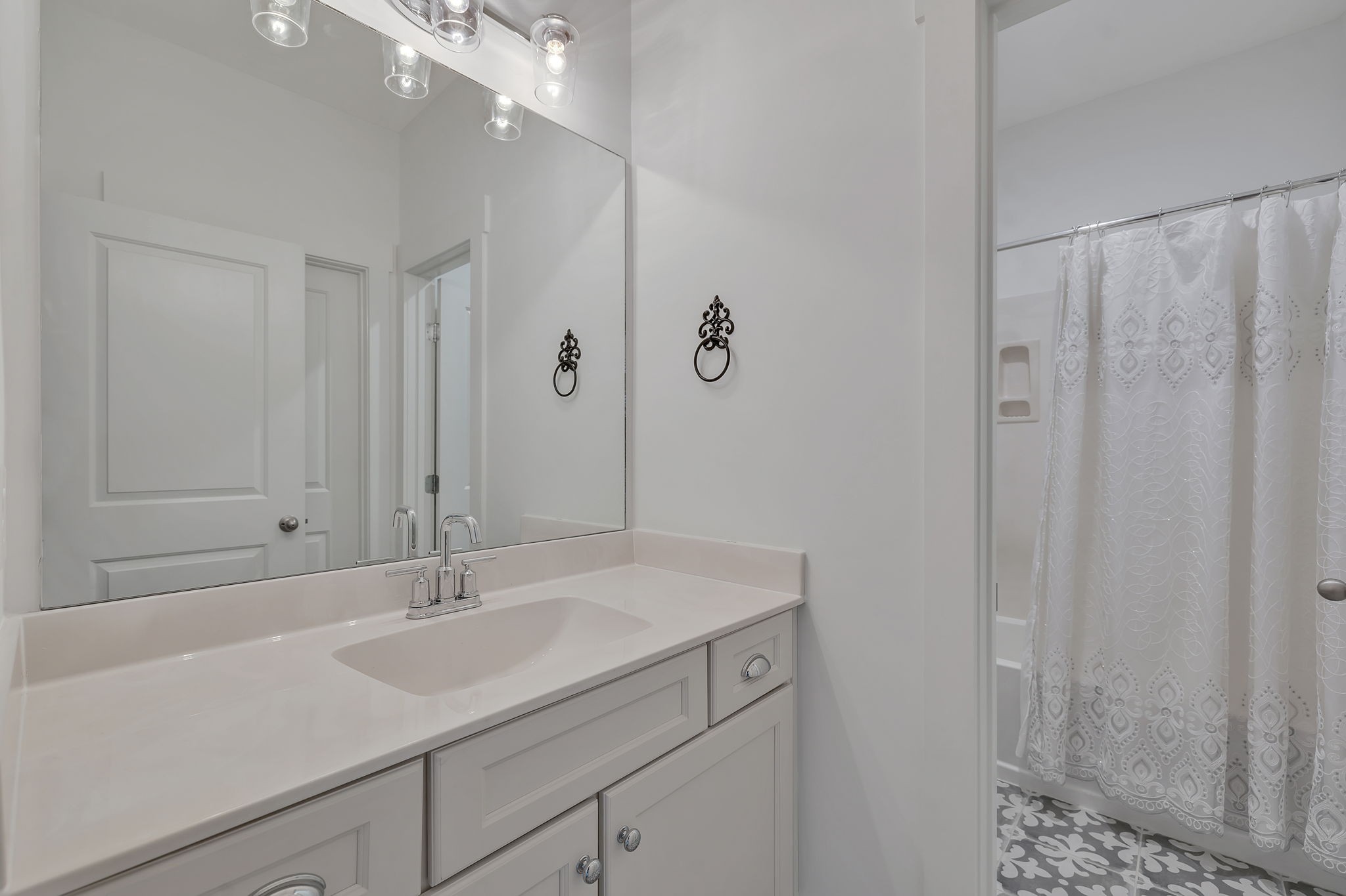 5821 Wagonvale Drive Arrington, TN 37014 - Photo 52 of 69 a bathroom with a sink and a mirror