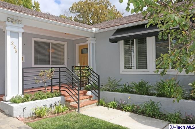 225 West Kenneth Road Glendale, CA 91202 - Photo 2 of 31 a front view of a house with a yard