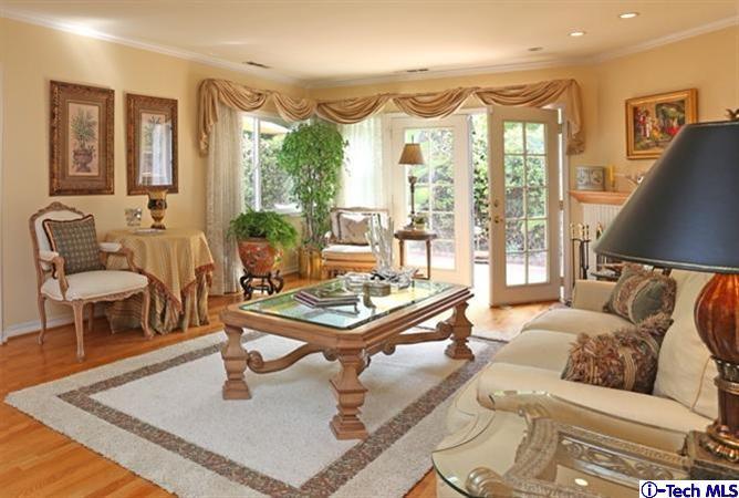 225 West Kenneth Road Glendale, CA 91202 - Photo 4 of 31 a living room with furniture and a large window