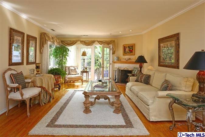 225 West Kenneth Road Glendale, CA 91202 - Photo 5 of 31 a living room with furniture and a large window