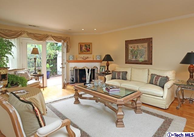 225 West Kenneth Road Glendale, CA 91202 - Photo 6 of 31 a living room with furniture and a fireplace